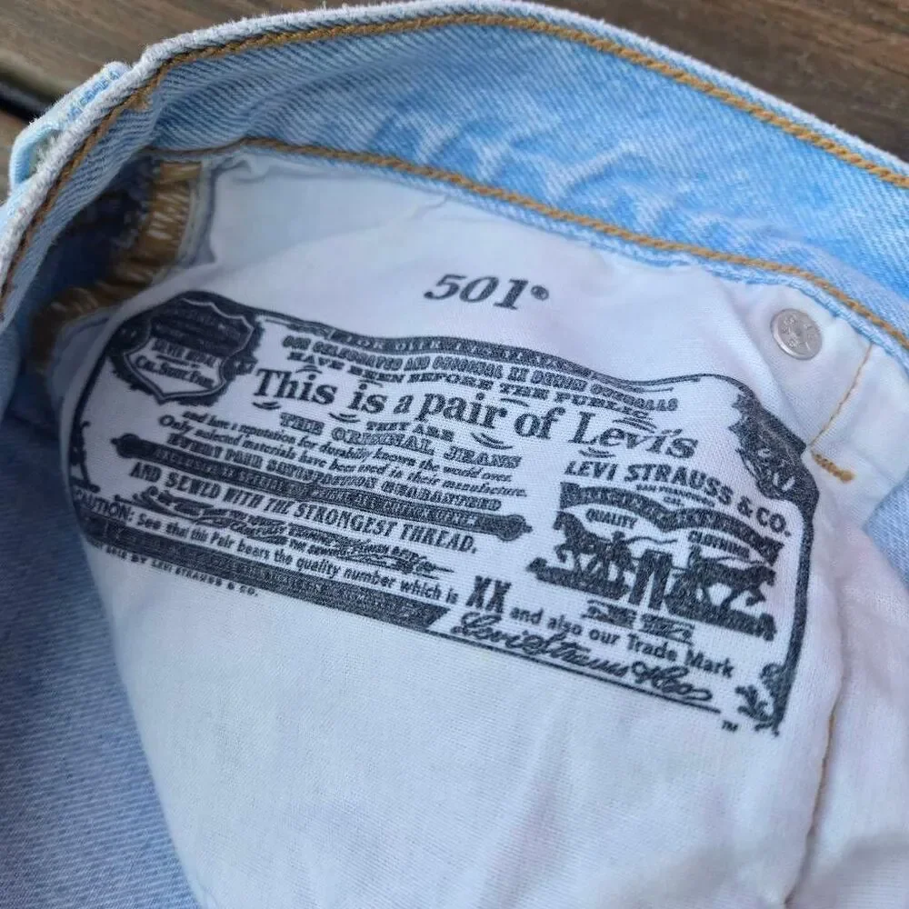 Levi's 501's men's jeans size 29x30 100% cotton light blue wash buttons